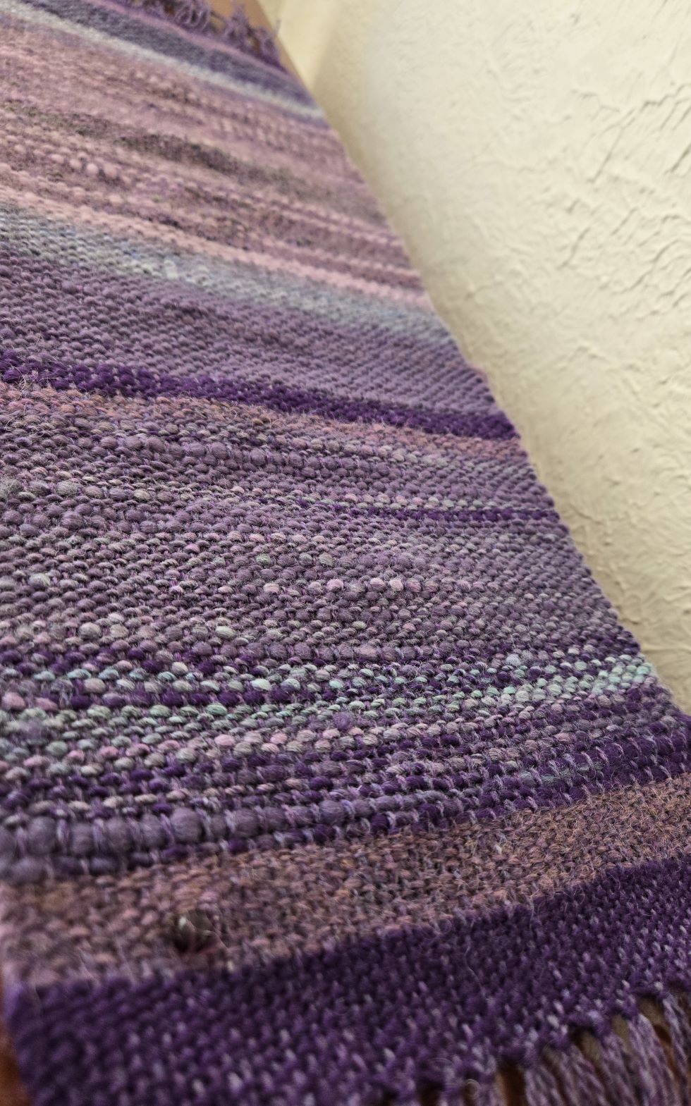 Handwoven altar cloth with shades of lavender: wool, silk and a stone bead
