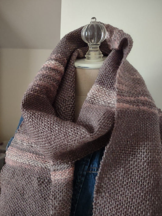 Cozy handwoven scarf features soft merino wool and a touch of mohair with colors in subtle shades of pink, pewter and coral. Handspun yarn on a Harrisville wool warp.