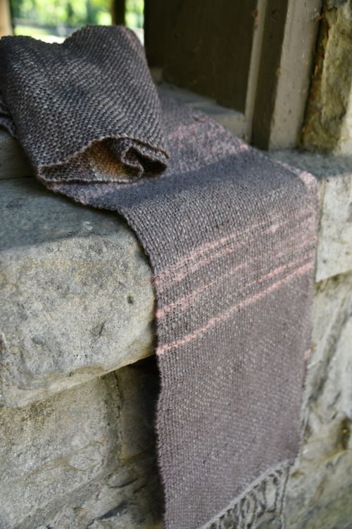 Cozy handwoven scarf features soft merino wool and a touch of mohair with colors in subtle shades of pink, pewter and coral.  Handspun yarn on a Harrisville wool warp.  