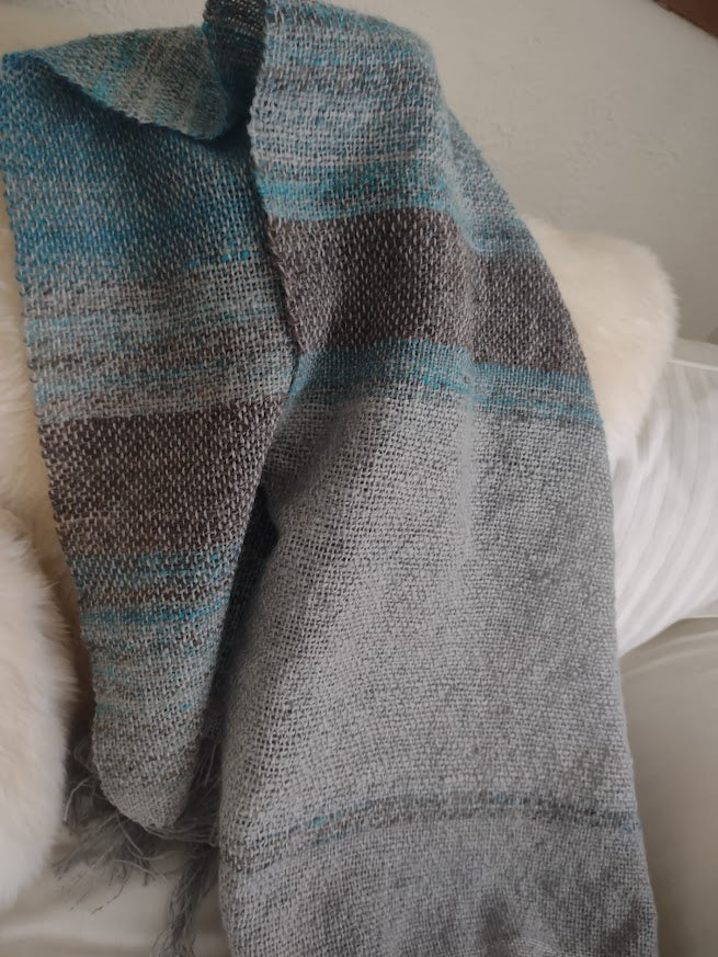 Handwoven lap blanket or wrap, from handspun wool yarns in pewter, grey and turquoise colors